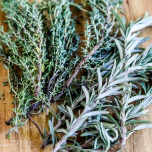 Rosemary and Thyme on cutting board
