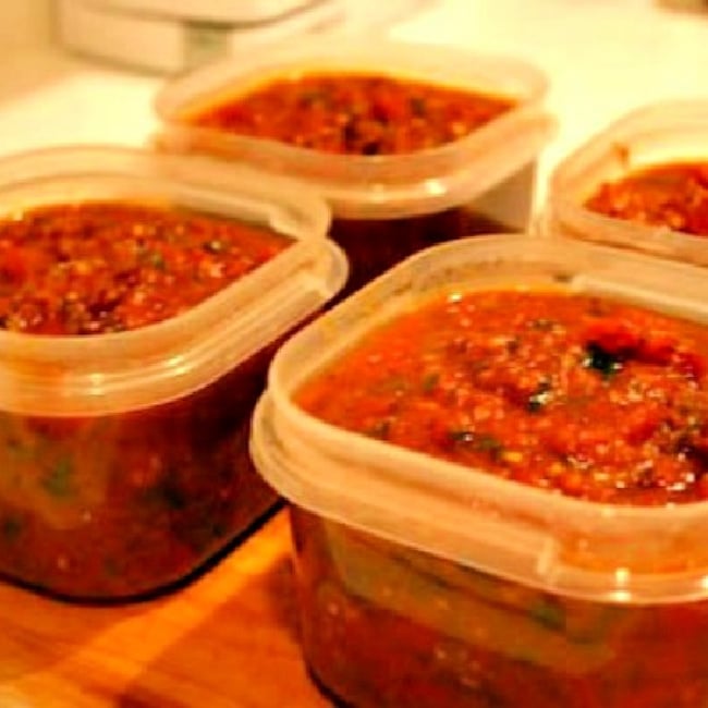 Sausage and Basil Marinara Sauce for the freezer shown in plastic containers