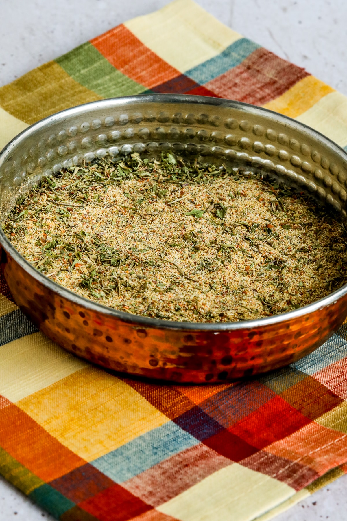 Chicken Seasoning Rub shown in copper dish.