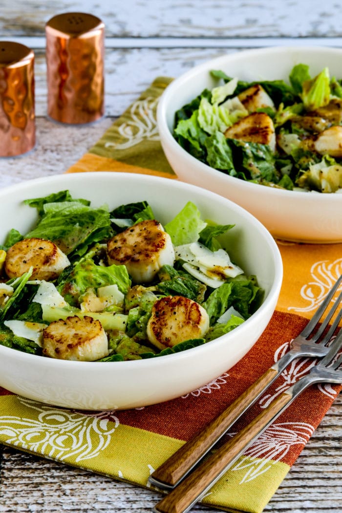 Warm Scallop Caesar Salad in two serving bowls