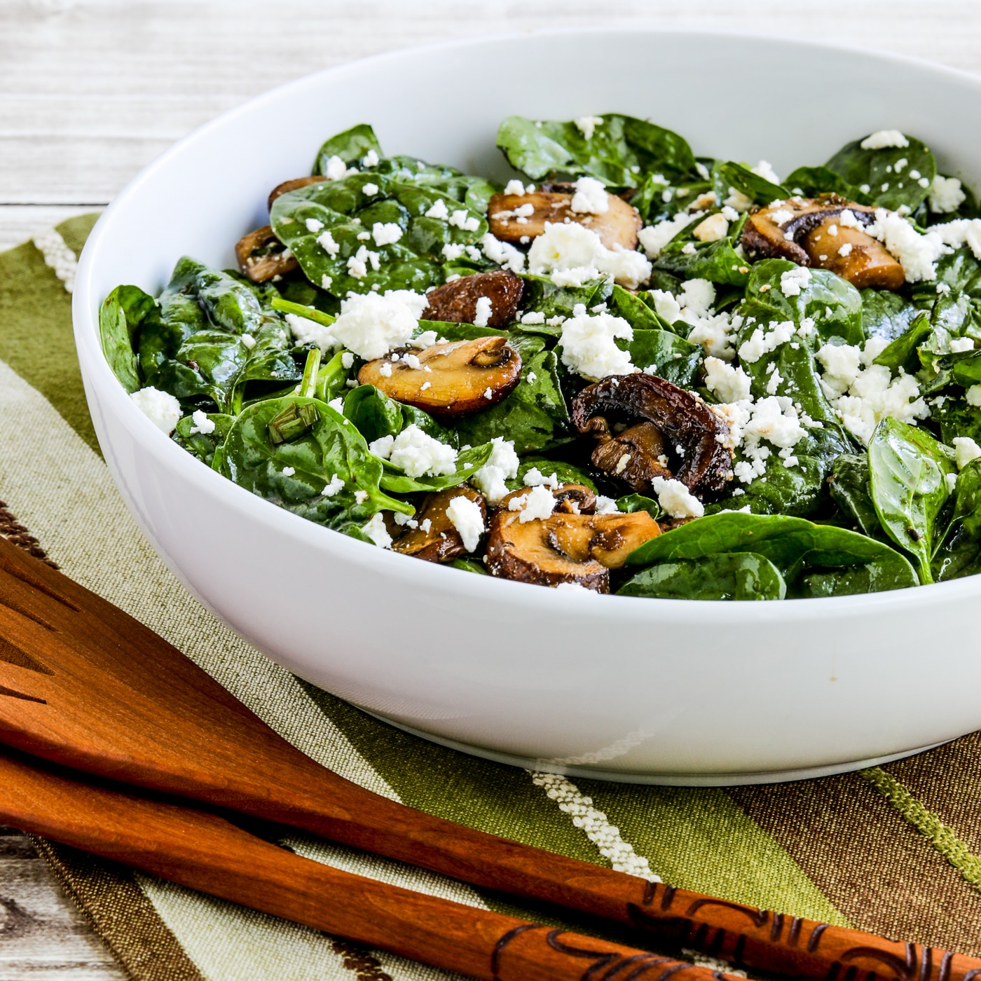 Balsamic Spinach Salad with Mushrooms and Feta thumbnail image of finished salad in serving bowl