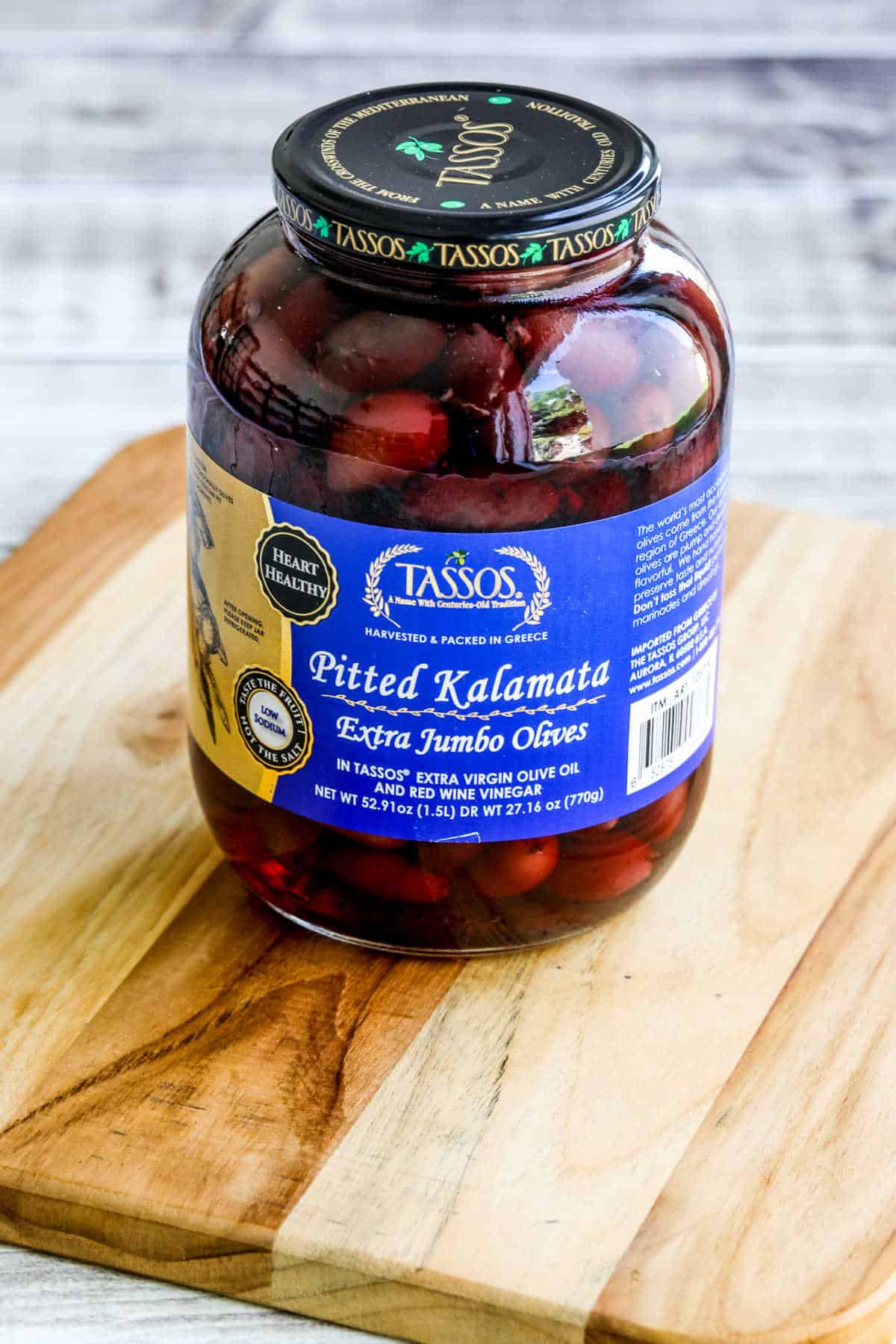 Kalyn's Kitchen Picks: Pitted Kalamata Olives in jar shown on cutting board