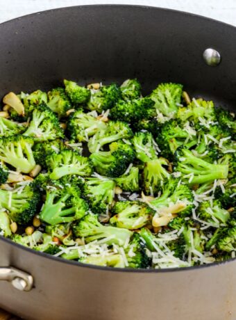 Pan-Fried Broccoli with Pine Nuts and Parmesan thumbnail image of broccoli in pan