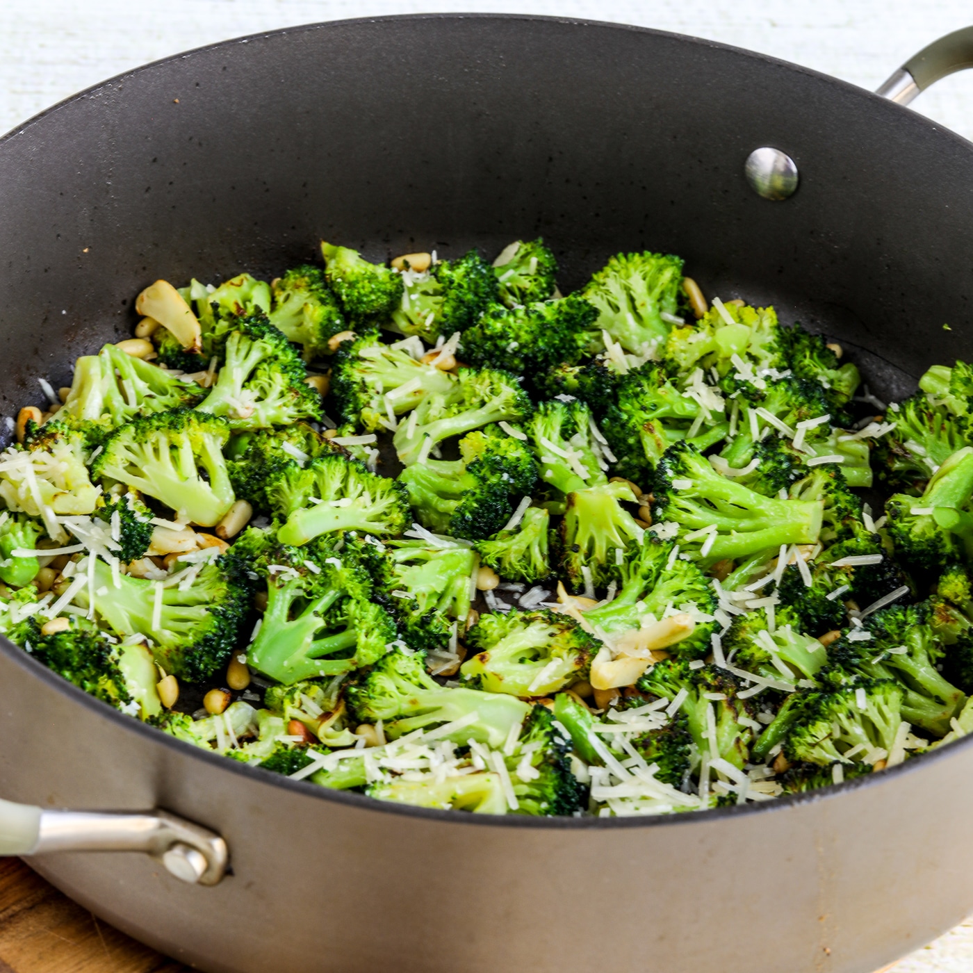 Pan-Fried Broccoli with Pine Nuts and Parmesan thumbnail image of broccoli in pan