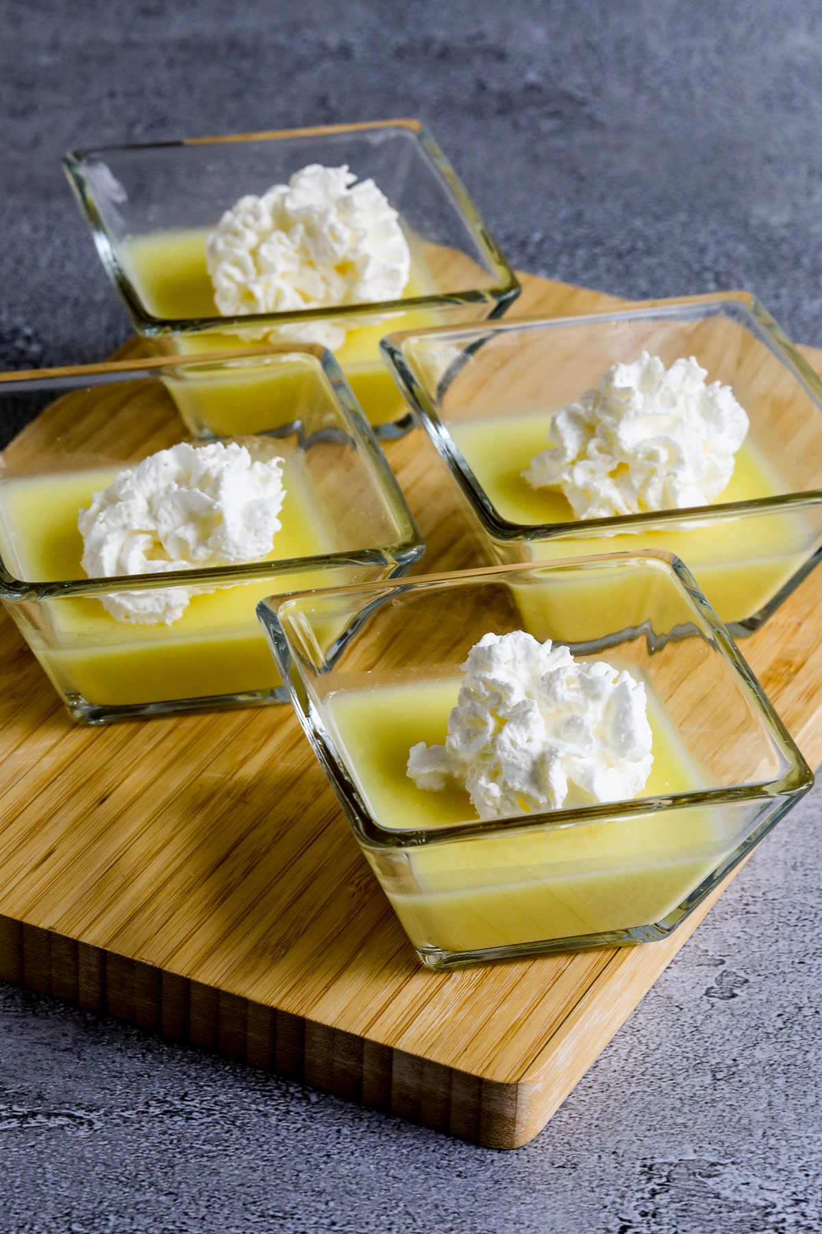 Sugar-Free Jelled Ricotta Pudding shown in four dishes.