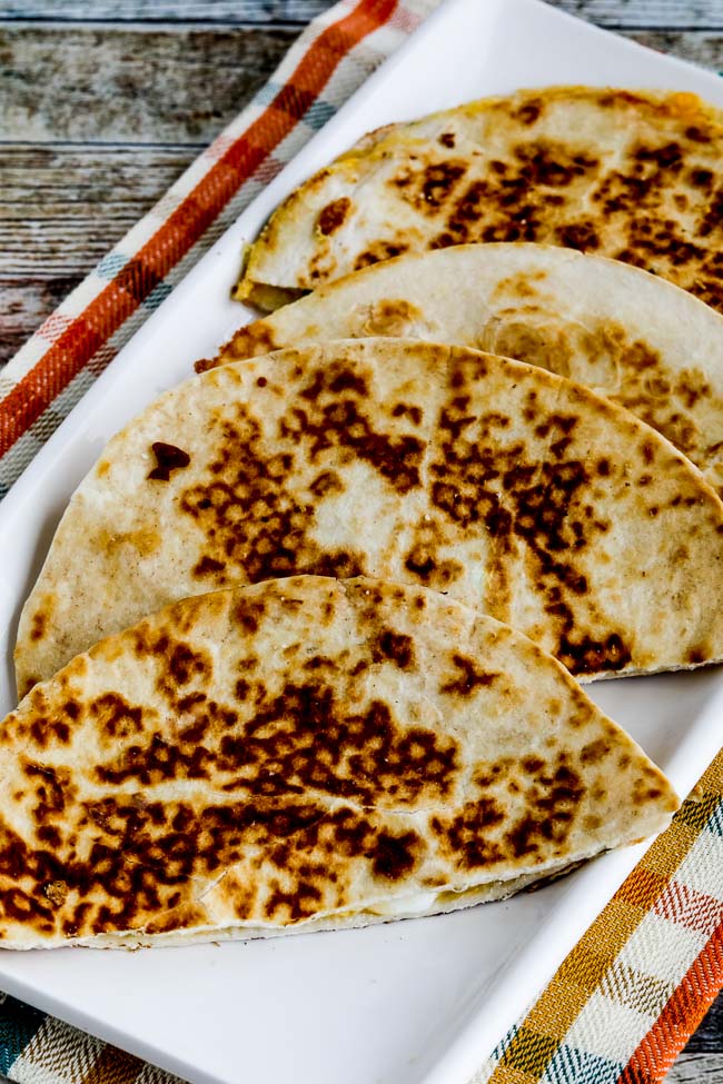 Egg Salad Breakfast Quesadillas shown on serving plate with napkin