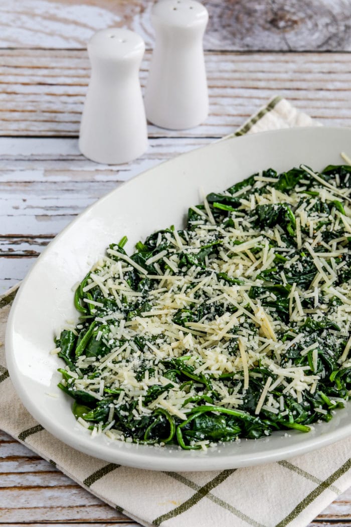 Stir-Fried Spinach with Garlic and Parmesan spinach on serving plate