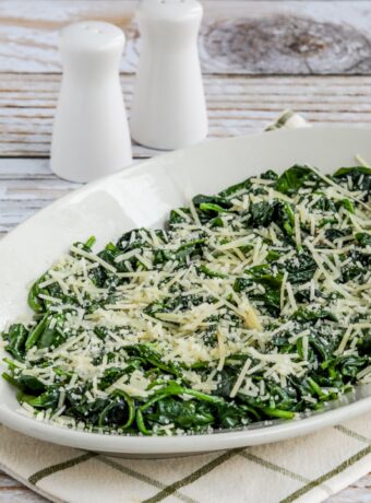 Stir-Fried Spinach with Garlic and Parmesan thumbnail square image of spinach on serving plate