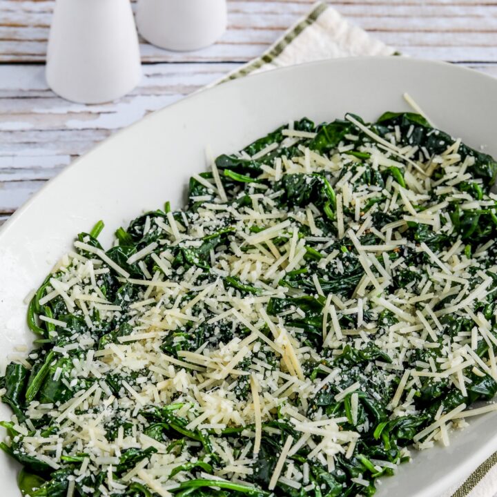 Stir-Fried Spinach with Garlic and Parmesan shown on serving plate