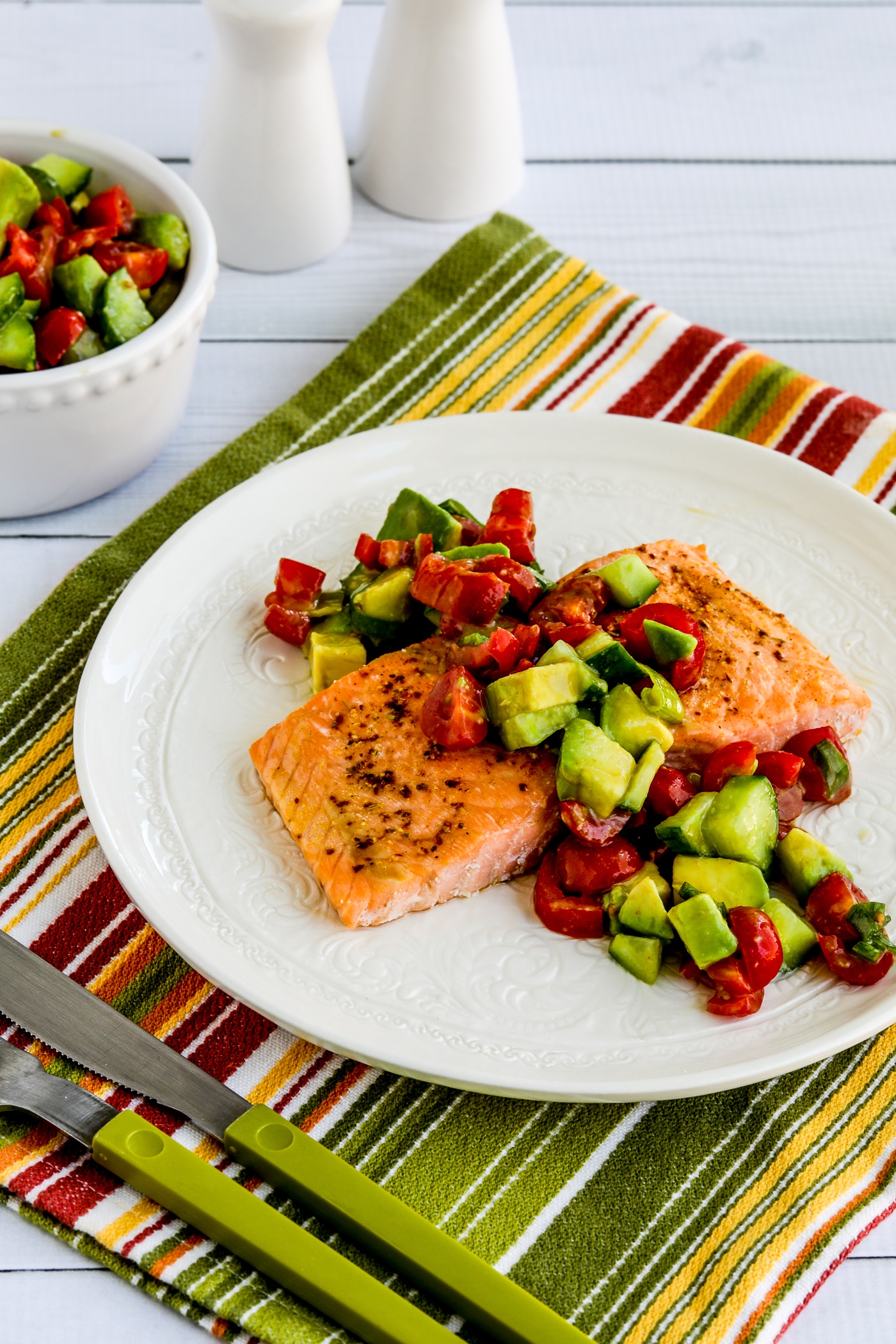 Roasted Salmon with Avocado Salsa piece of salmon in plate with salsa