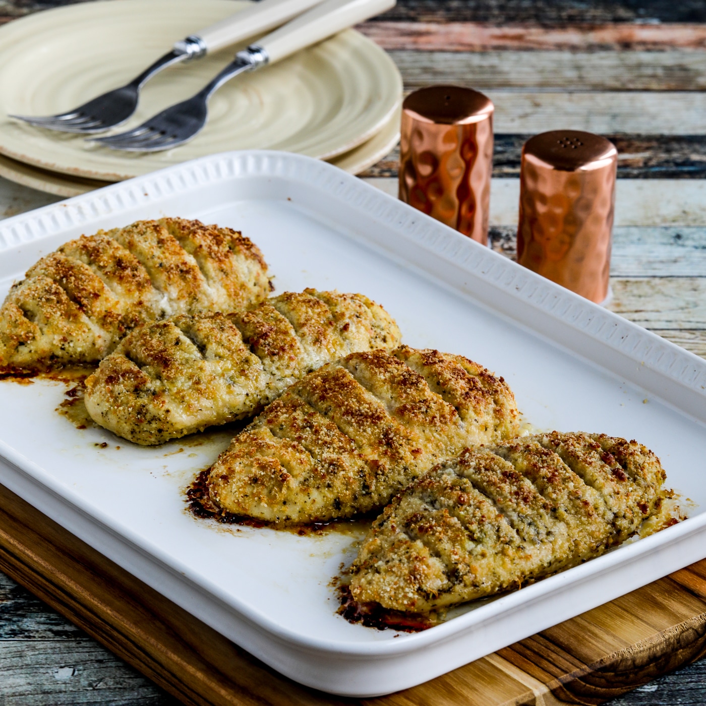 square image of Baked Parmesan Crusted Chicken on serving platter