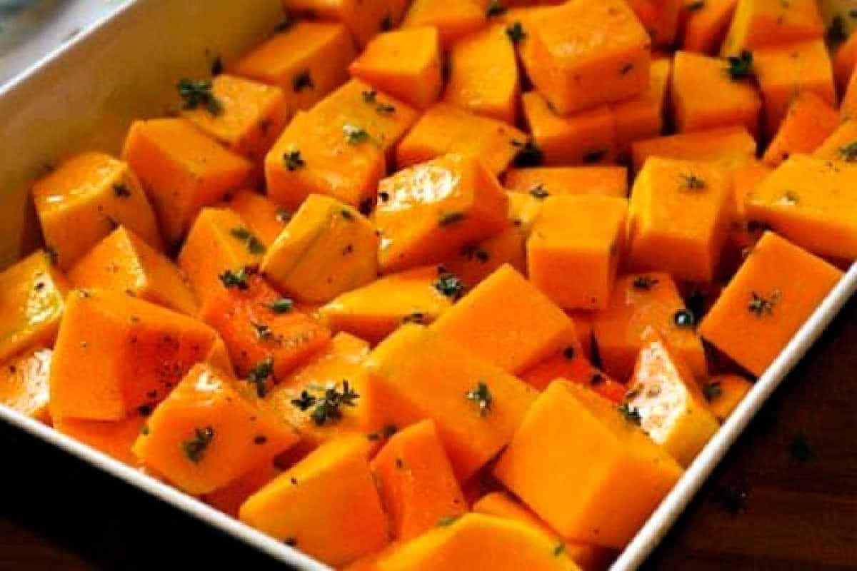How to Peel and Cut Up a Butternut Squash horizontal photo of squash cubes in dish