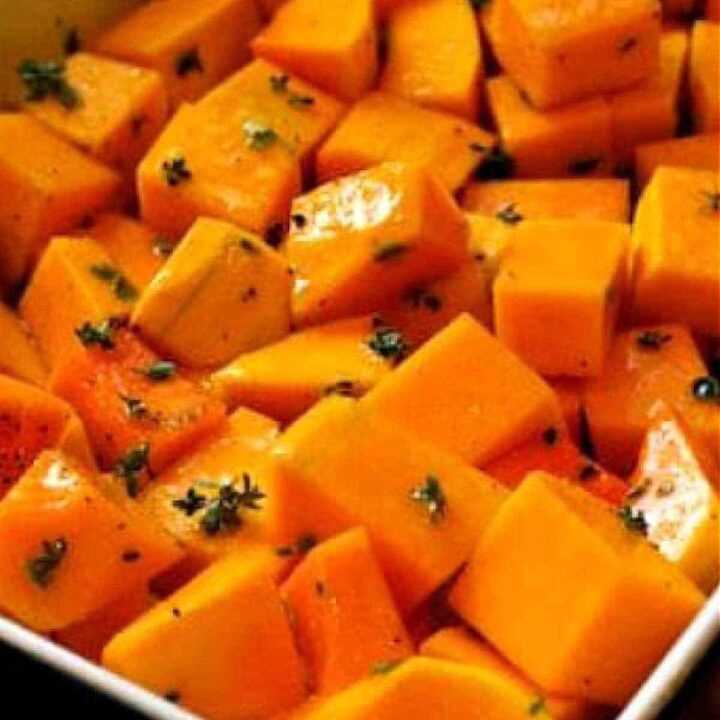 How to Peel and Cut Up a Butternut Squash square image of cut squash pieces in baking dish