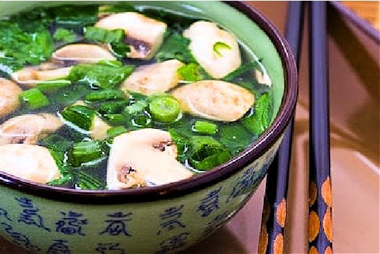 Healing Asian Soup with Ginger, finished soup in bowl horizontal image