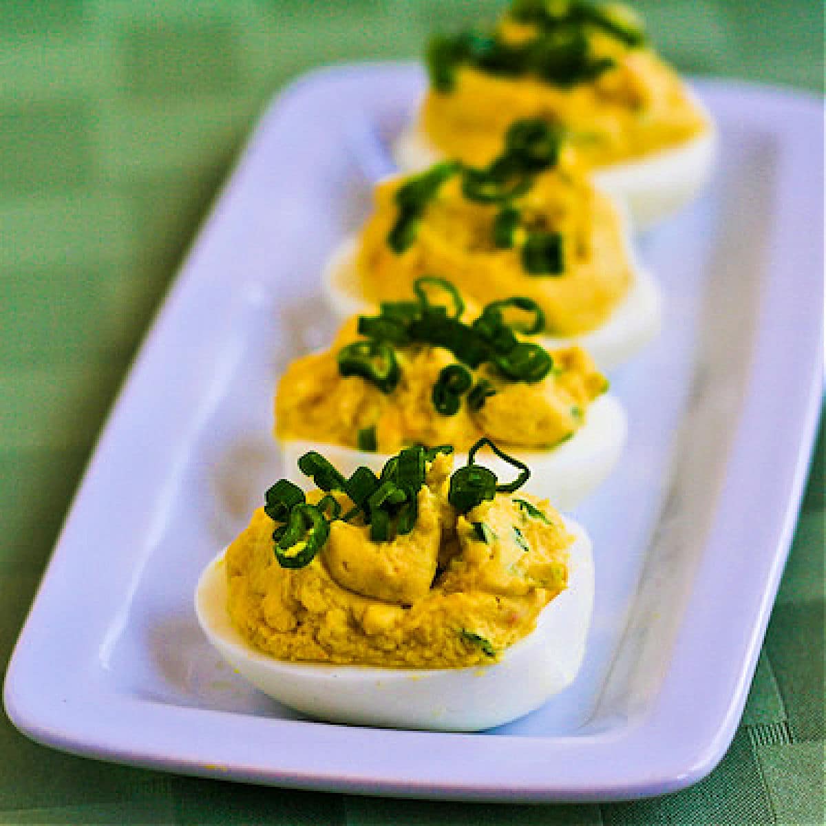 Shrimp Deviled Eggs shown on serving plate.