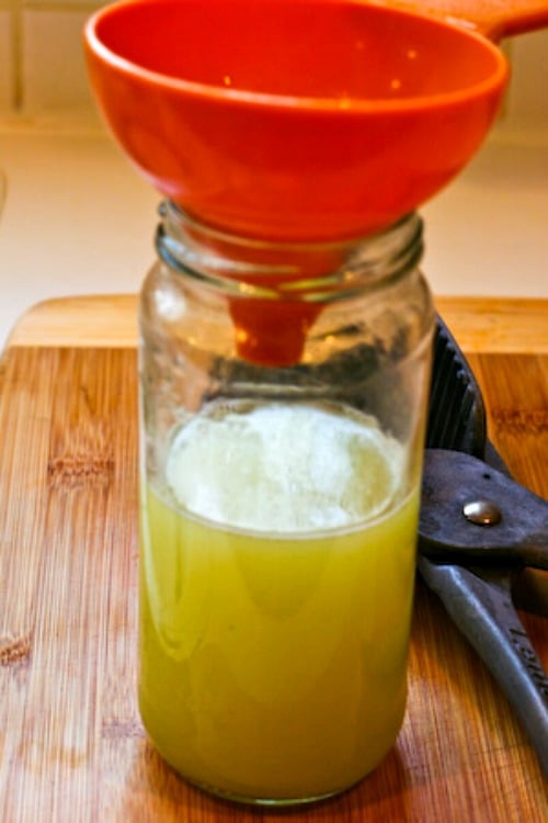 Using funnel for Tips for Freezing Fresh Lemon Juice and Lime Juice