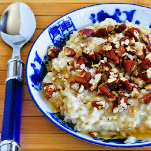 Steel-Cut Oats with Maple Syrup and Pecans finished dish in serving bowl