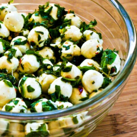 Marinated Fresh Mozzarella with Herbs finished salad in serving bowl