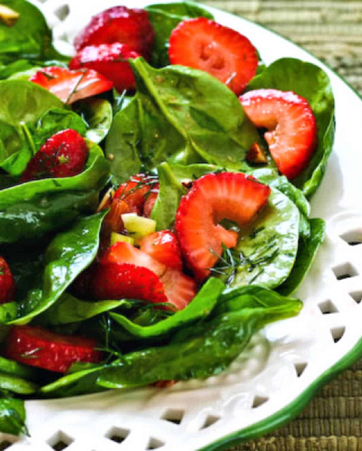 vertical image for Strawberry Spinach Salad on serving plate