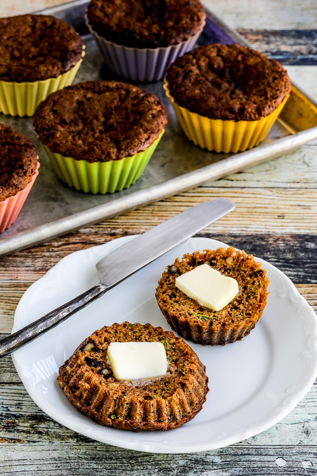 Flourless Zucchini Muffins finished muffin cut open with pat of butter