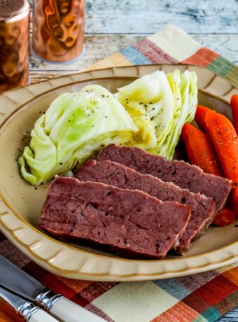 Slow Cooker Corned Beef square thumbnail image of finished corned beef on plate