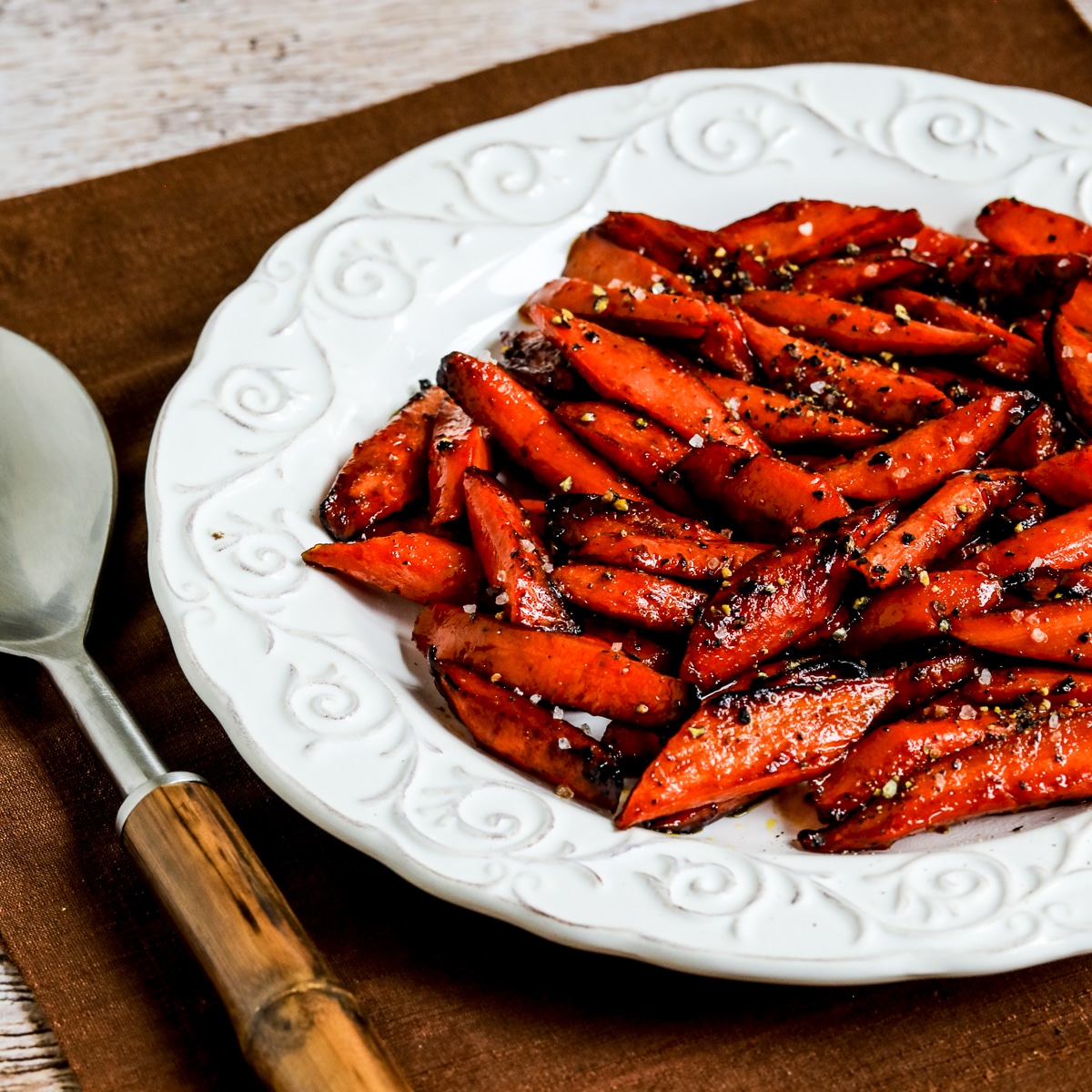Square image for Maple Glazed Carrots shown on serving plater.
