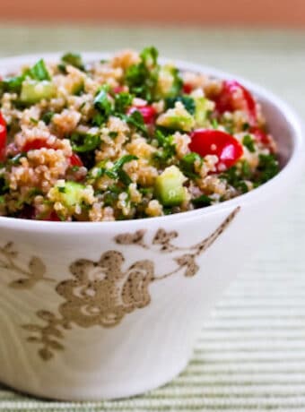 Quinoa Tabbouleh Salad shown in serving bowl.