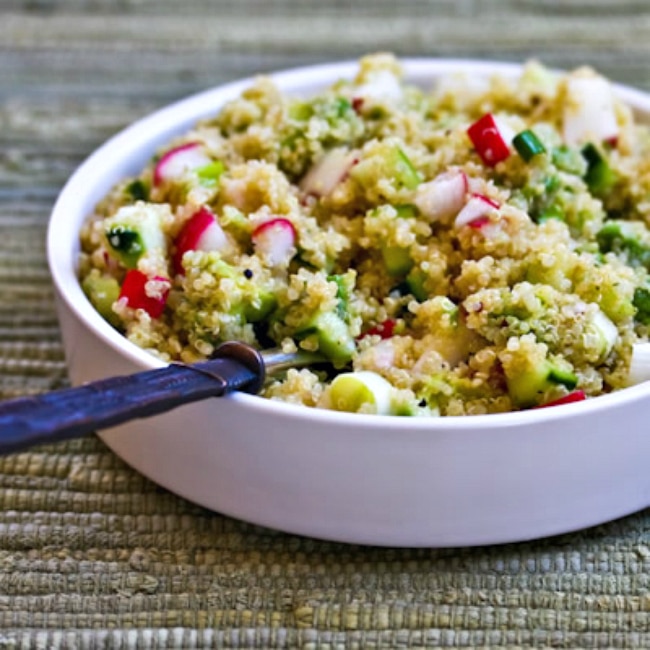 Quinoa Salad with Avocado, Radishes, and Cucumbers large thumbnail photo with finished salad in serving bowl