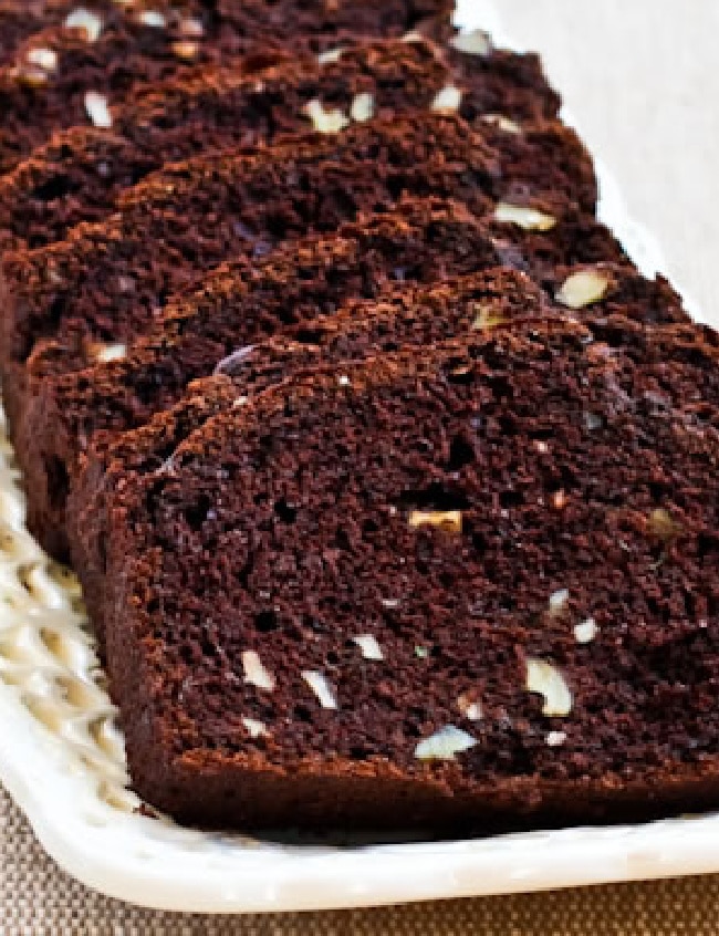 Sugar-Free Whole Wheat Chocolate Zucchini Bread shown sliced on serving plate