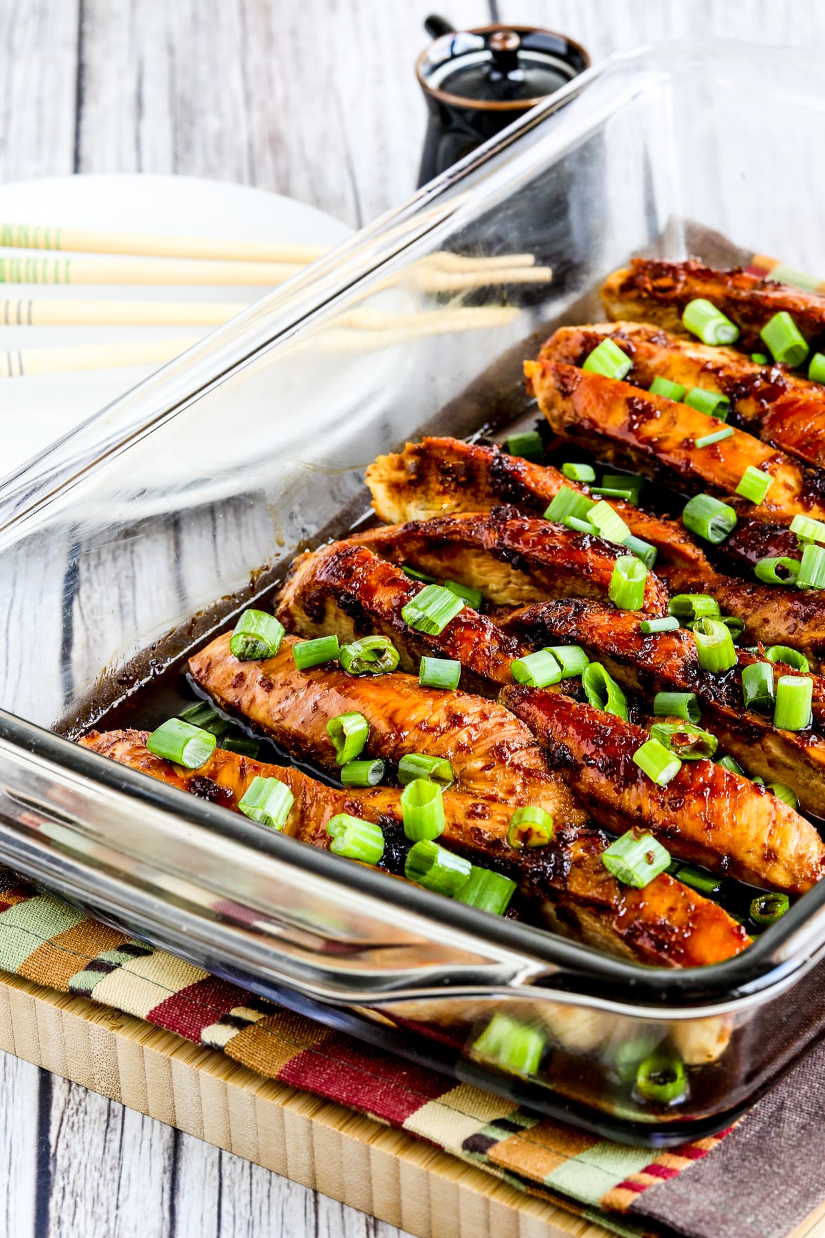 Baked Teriyaki Chicken (Sugar-Free) shown in baking dish on napkin