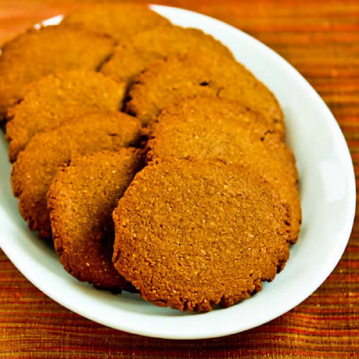 Low-Sugar Healthy Molasses Cookies shown on serving plate.