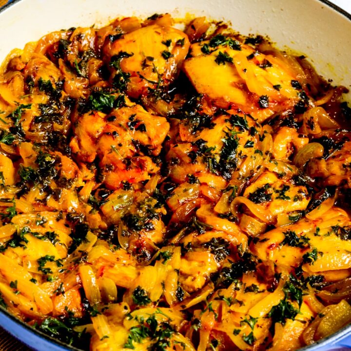 Saffron Chicken with Parsley and Lemon shown in pan it was cooked in.