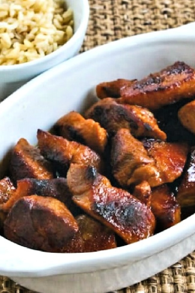 Filipino Pork Adobo in serving dish with rice.