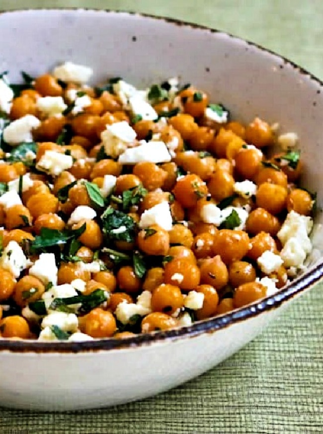 Garlic Roasted Chickpeas with Feta, Mint, and Lemon shown in serving dish.