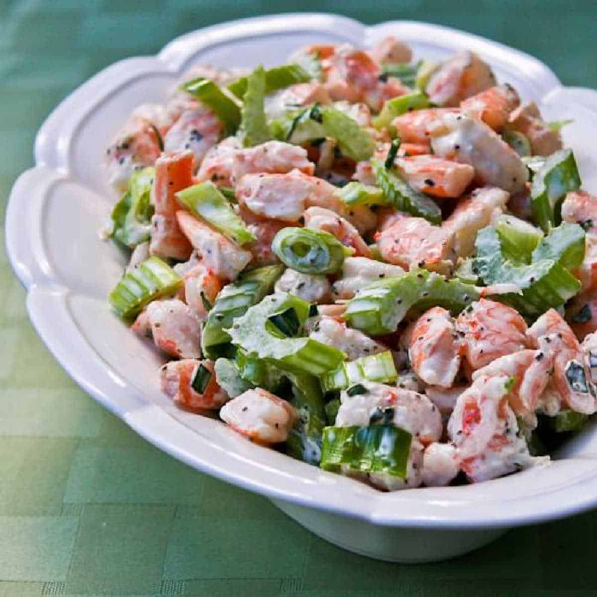 Tarragon Shrimp Salad shown in serving bowl on green napkin
