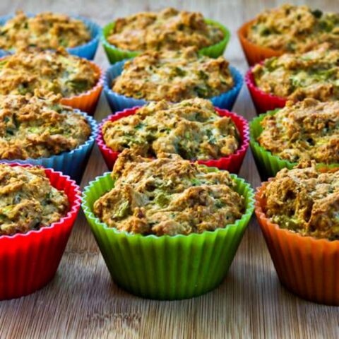 Whole Wheat Zucchini Muffins with Green Chiles and Cheese on cutting board