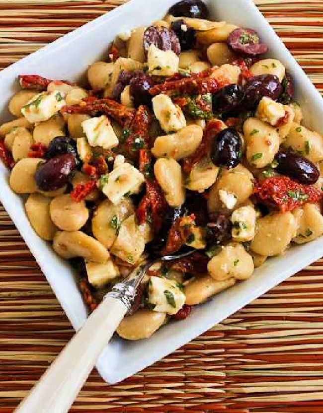 Butter Bean Salad shown in serving bowl with spoon