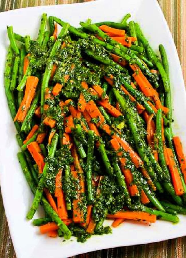 Vegetables with Chermoula Sauce showing green beans and carrots.