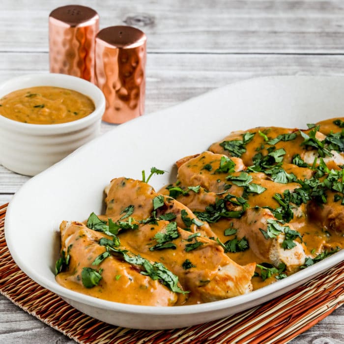 Chicken with Peanut Sauce square thumbnail image of chicken on serving plate