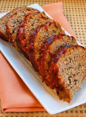 Square image for Pesto Meatloaf shown on serving platter.