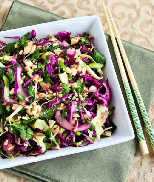 Cropped image of Thai Cabbage Salad in serving bowl with chopsticks.