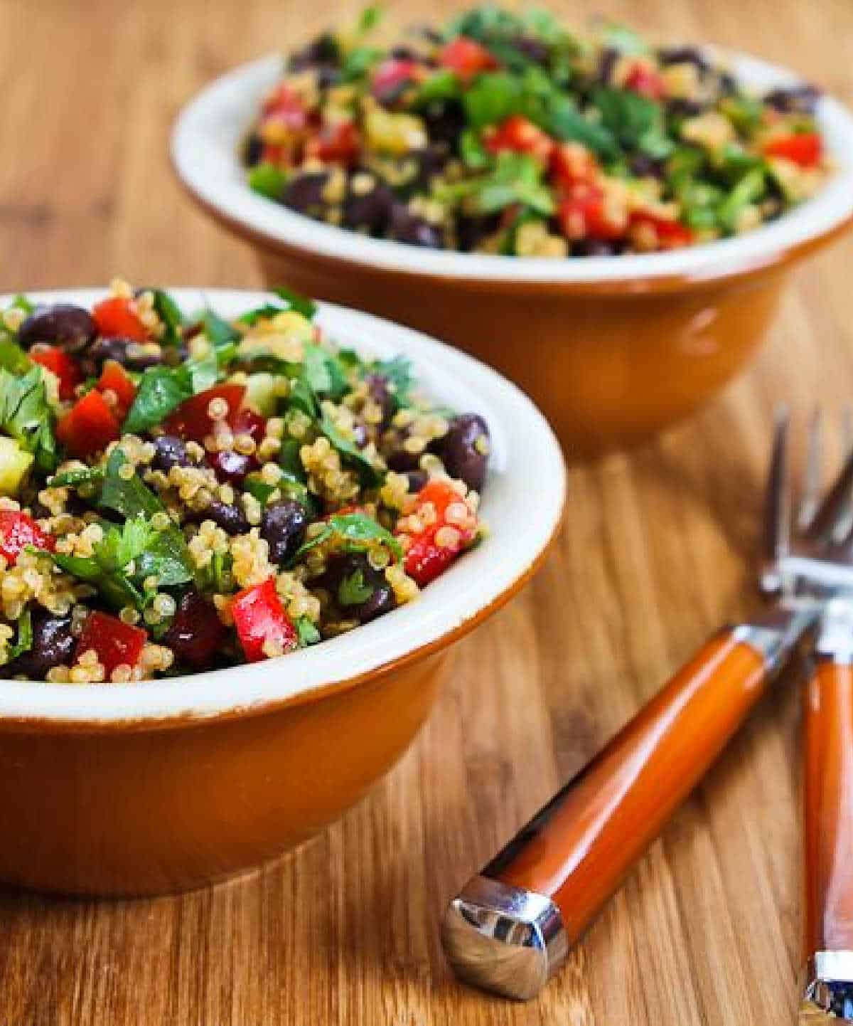 Southwestern Quinoa Salad Crop a photo of two bowls of salad