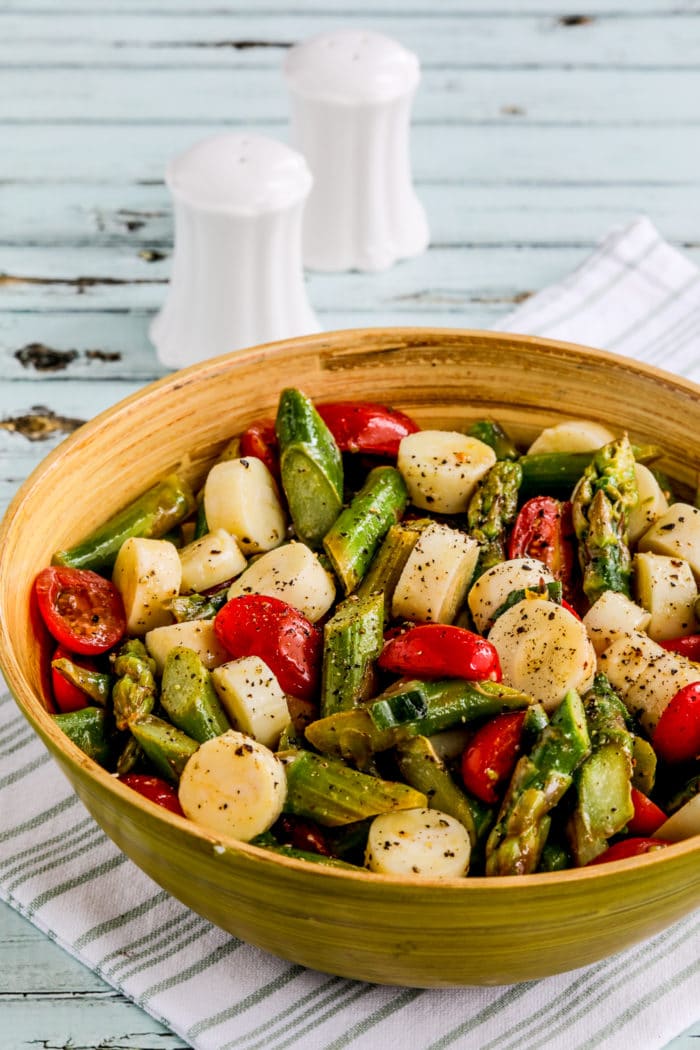 Asparagus and Tomato Salad with Hearts of Palm salad in serving bowl
