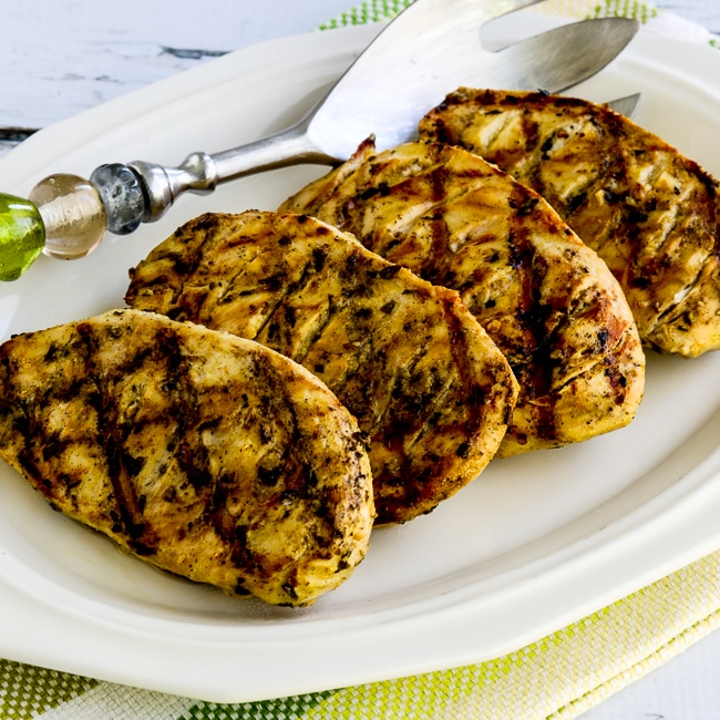 Grilled Chicken with Tarragon-Mustard Marinade square image of chicken on serving plate