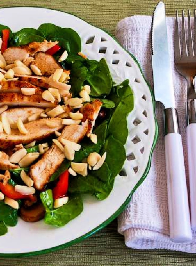 Cropped image of Spinach Salad with Chicken on serving plate.