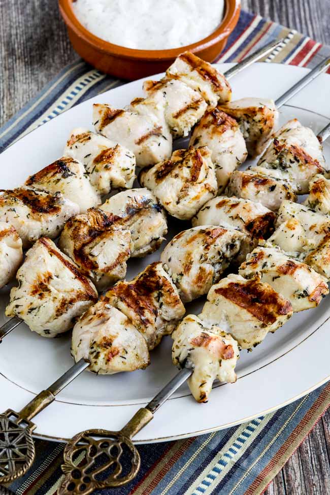 Chicken Souvlaki on skewers shown on serving platter