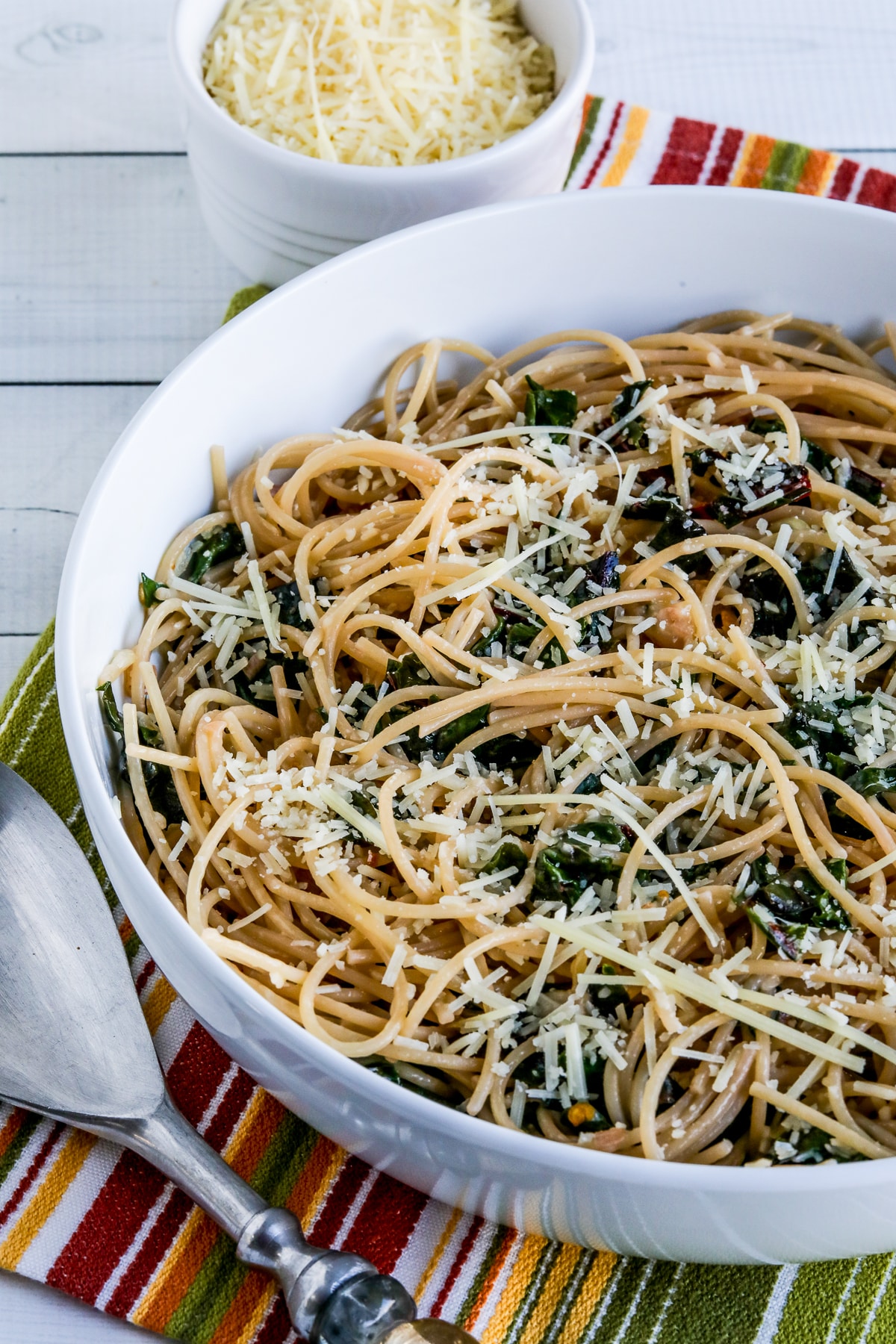 Spaghetti with Garlic, Chard, and Cheese shown in serving bowl.
