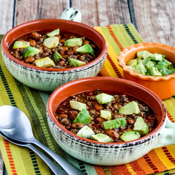Instant Pot Pinto Beans with Ground Beef square thumbnail image of bean stew in two bowls, with avocado