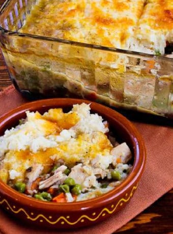 Turkey Shepherd's Pie with Cauliflower Topping one serving in bowl and casserole in background
