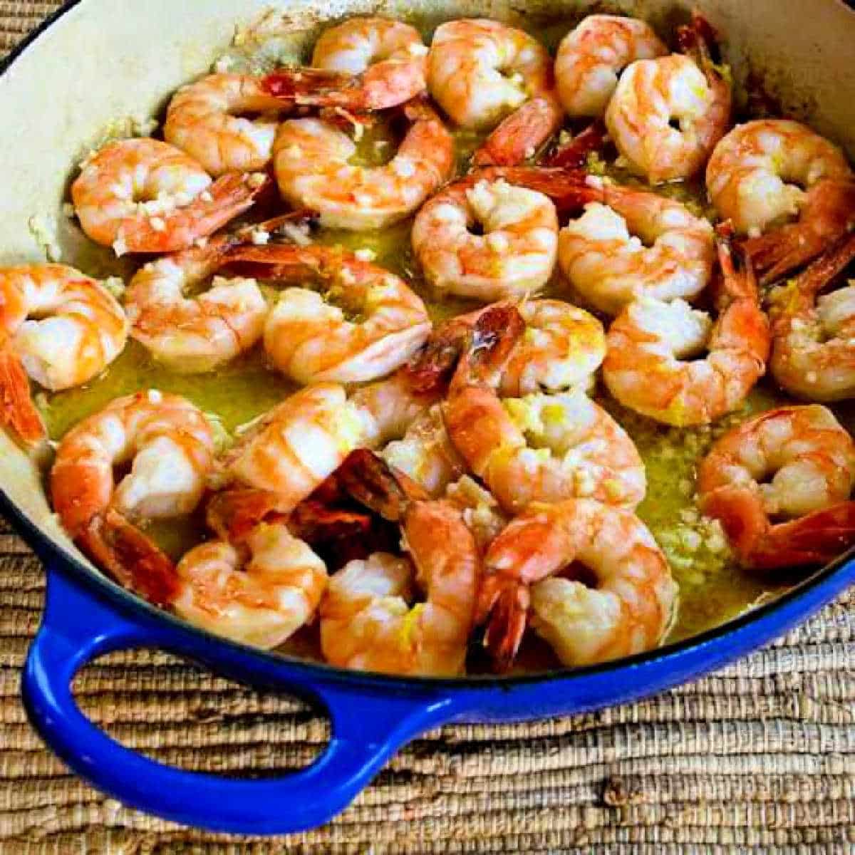 Easy Garlic and Lemon Shrimp shown on heavy cooking pan